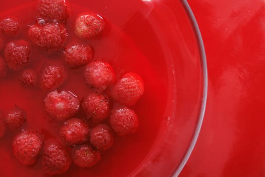 sweet strawberry background on the red background