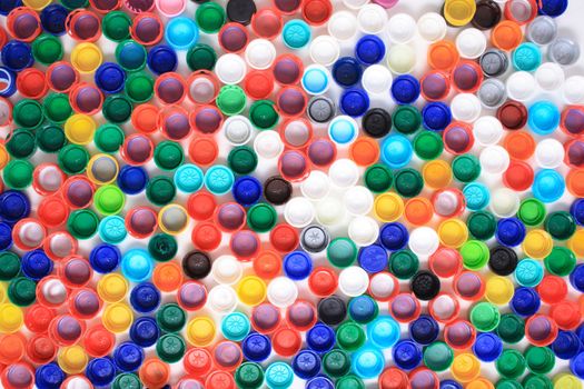 plastic background from the rainbow used caps