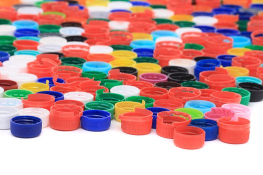 rainbow background from different colors plastic caps 