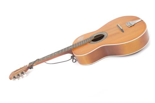 nice old guitar isolated on the white background