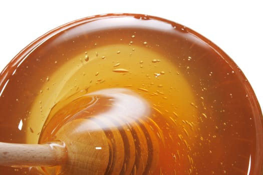 nice honey bacground with the wooden stick