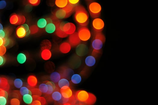 abstract color christmas background from the light bulbs