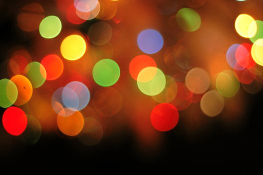 abstract color christmas background from the light bulbs
