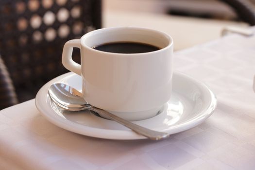 fresh cup of cafe on the table 