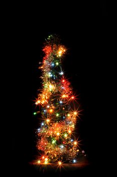 christmas bottle with color lights in the dark night