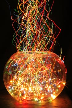 christmas glass sphere with color lights in the dark night