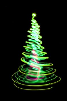 christmas tree form the color lights on the black background