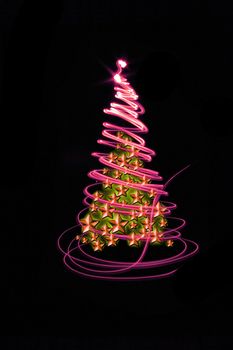 christmas tree form the color lights on the black background