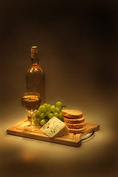 wine, grapes, cheese and bread 