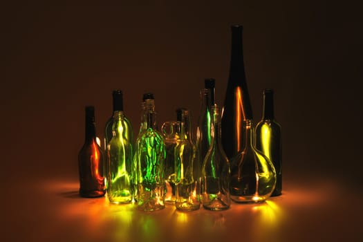 empty bottles in the night as interesting color background