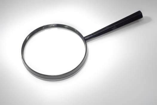 magnify glass isolated on the white paper 
