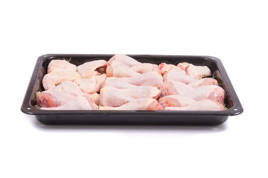 raw chicken legs isolated on the white background