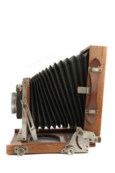 very old photo camera isolated on the white background