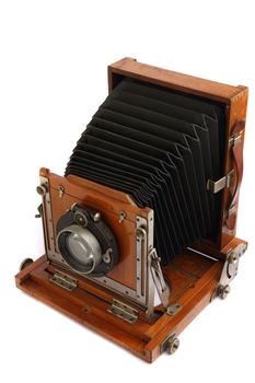 old wooden photo camera isolated on the white background