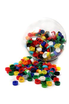 plastic caps in the glass sphere isolated on the white background