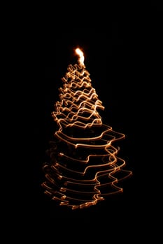 christmas tree frrom the bulb light on the black background