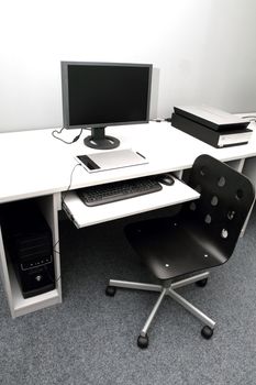 small computer studio in gray and black
