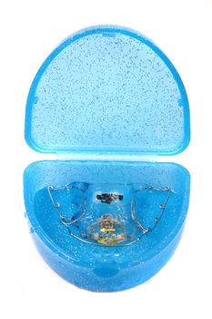 braces in blue box isolated on the white background