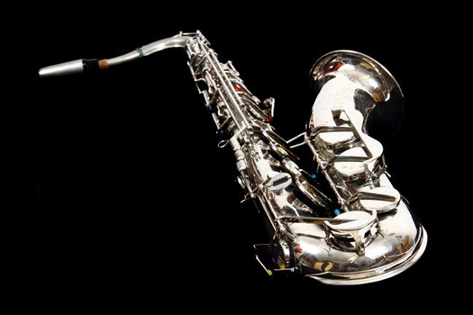 silver saxophone isolated on the black background