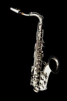 silver saxophone isolated on the black background