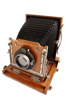 old wooden photo camera isolated on the white background