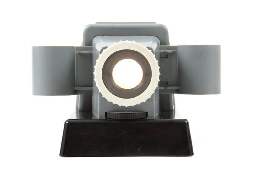 old projector (diascope) isolated on the white background