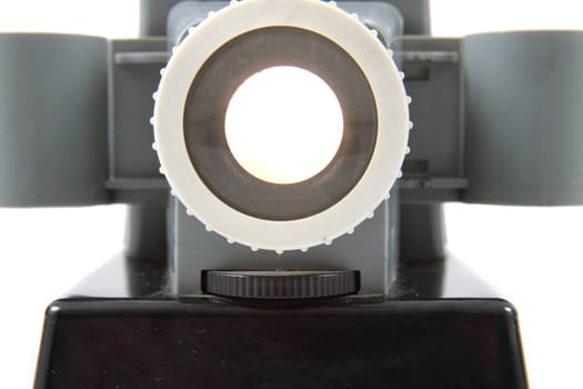 old projector (diascope from 1950) isolated on the white background