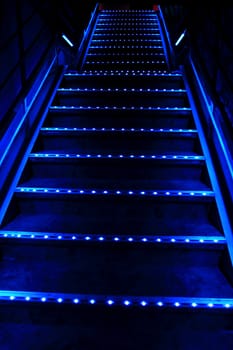 blue stairway in the very dark night 