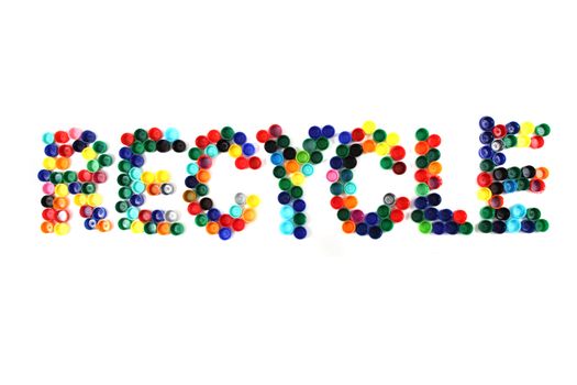 word recycle from color plastic caps isolated on the white background