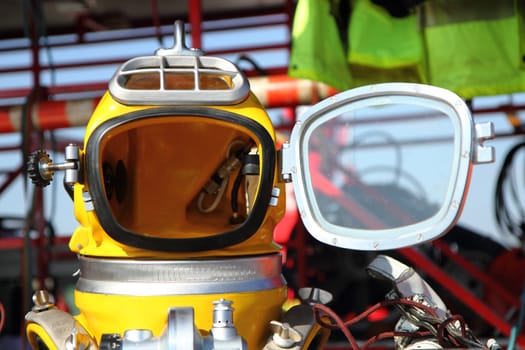 modern diver helmet (open face an yellow color)