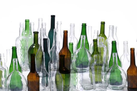 color glass bottles on the white background