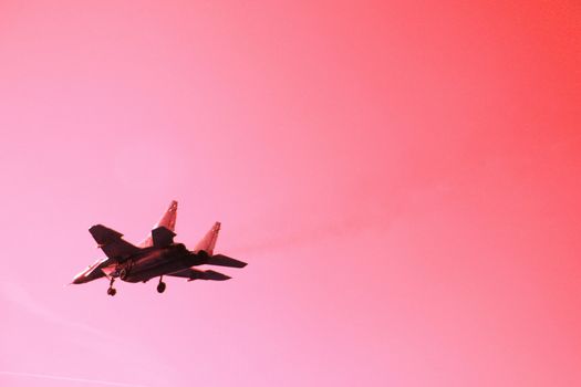 aircraft in the sky on the red background