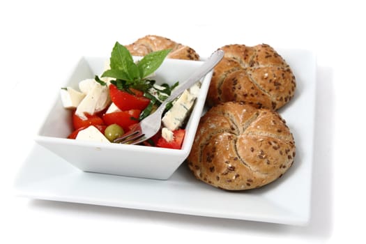 vegetable salad (tomato, basil, olive) isolated on the white background