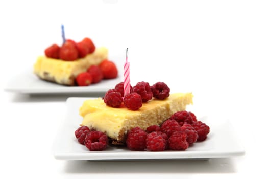 cheesecake with fruits isolated on the white background