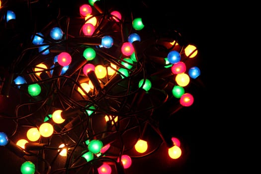 abstract color christmas lights on the black background