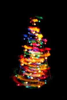 xmas tree from the christmas lights in the night