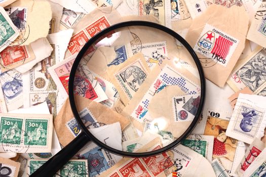 postage stamp and magnify glass as nice background