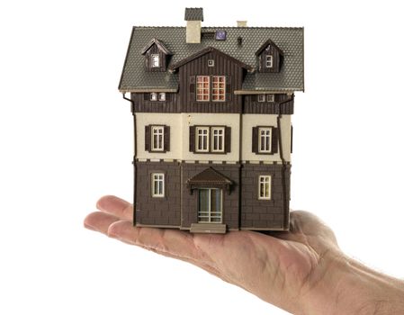 hand holding house with  white background