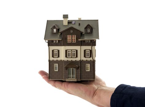 hand holding house with  white background