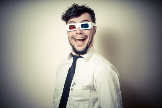 funny businessman with 3d eyewear on gray background