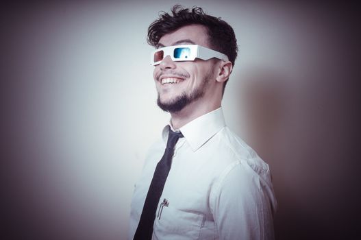 businessman with 3d eyewear on gray background