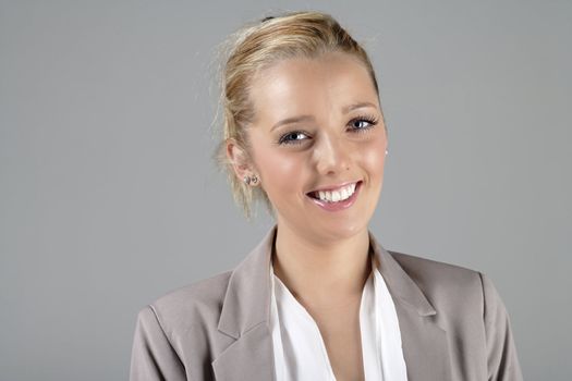 Young woman in smart business suit with attractive smile