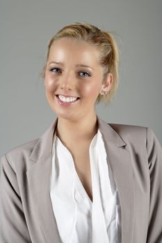Young woman in smart business suit with attractive smile
