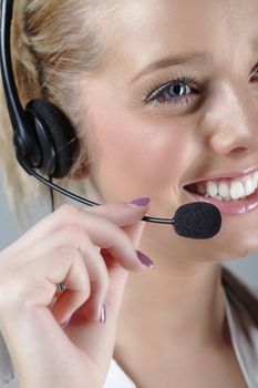 Call centre operator using a telephone headset.