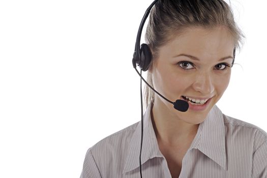 Young woman wearing a telephone headset talking on the phone