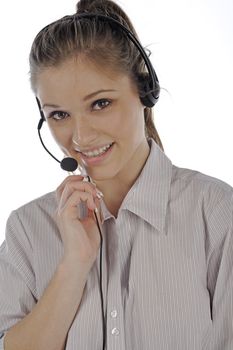 Young woman wearing a telephone headset talking on the phone