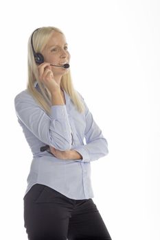 Young woman in smart clothes using a call centre head set