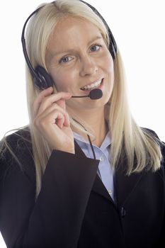 Young woman in smart clothes using a call centre head set