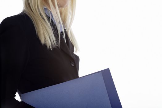 Young business professional holding blue folders on an isolated background