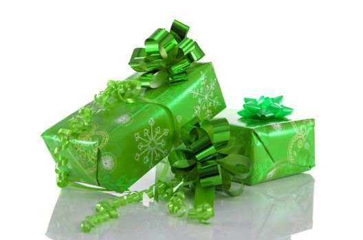 two green presents isolated on white